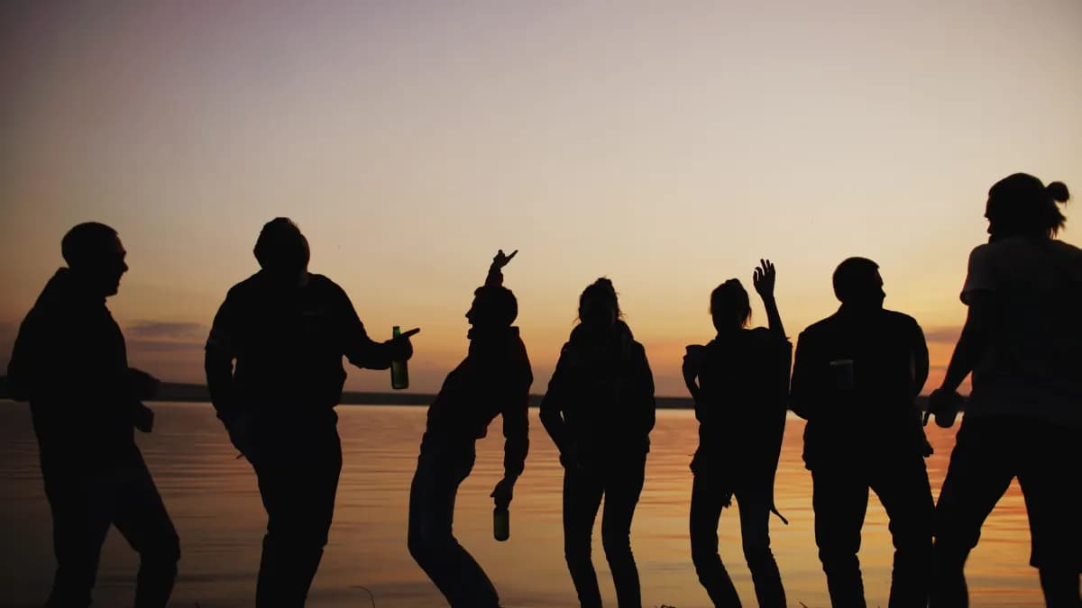 Friends sharing time together as the sun goes down